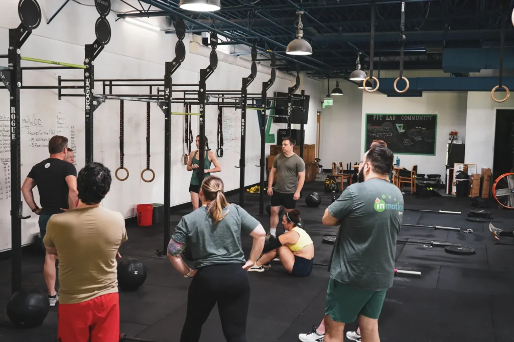 Group of athletes at Fit Lab Community gym with Rogue training equipment